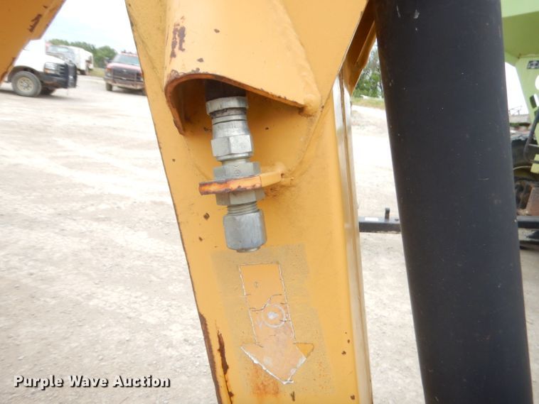 image for item GN9452 2002 Caterpillar BH-30W skid steer backhoe attachment