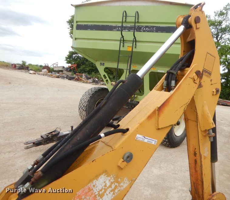 image for item GN9452 2002 Caterpillar BH-30W skid steer backhoe attachment