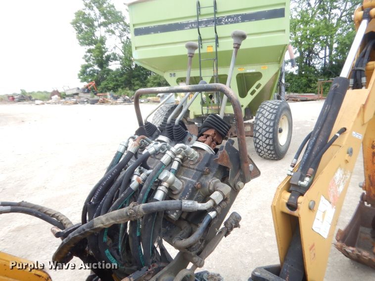 image for item GN9452 2002 Caterpillar BH-30W skid steer backhoe attachment