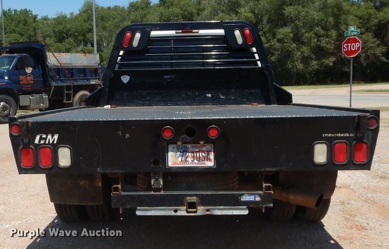 image for item HS9691 2005 Ford F350 Super Duty  Crew Cab flatbed pickup truck