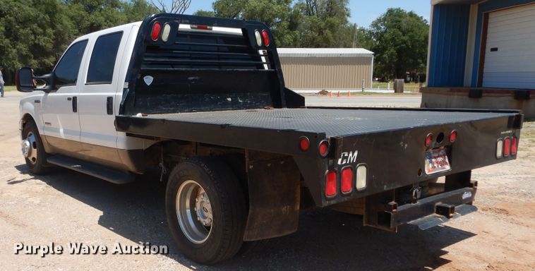 image for item HS9691 2005 Ford F350 Super Duty  Crew Cab flatbed pickup truck