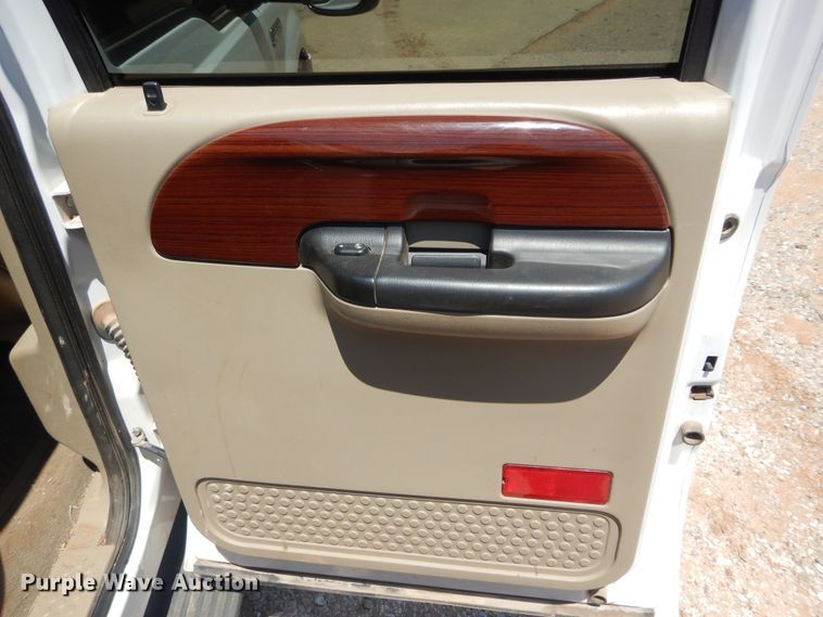 image for item HS9691 2005 Ford F350 Super Duty  Crew Cab flatbed pickup truck