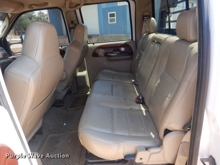 image for item HS9691 2005 Ford F350 Super Duty  Crew Cab flatbed pickup truck