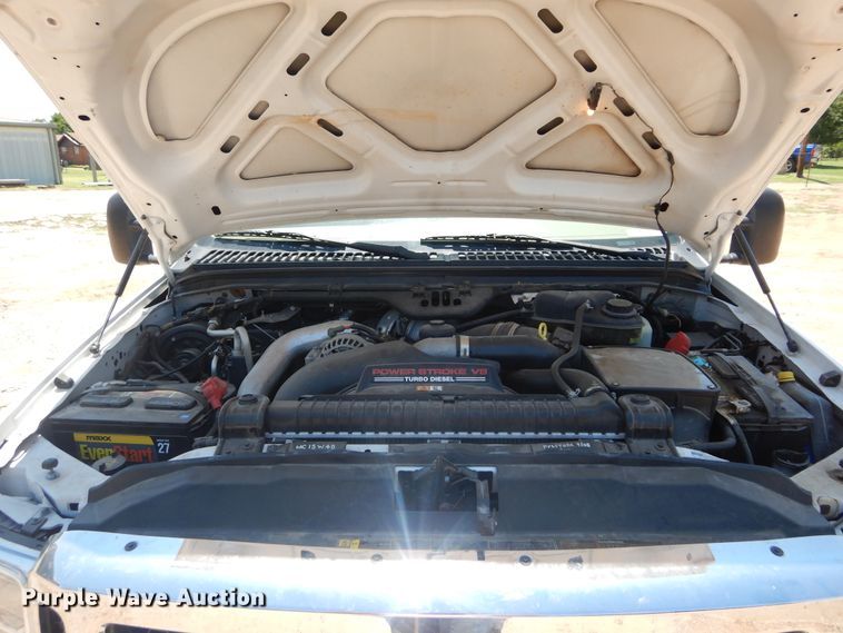 image for item HS9691 2005 Ford F350 Super Duty  Crew Cab flatbed pickup truck