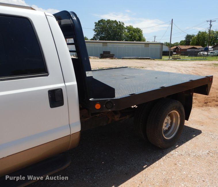 image for item HS9691 2005 Ford F350 Super Duty  Crew Cab flatbed pickup truck