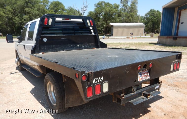 image for item HS9691 2005 Ford F350 Super Duty  Crew Cab flatbed pickup truck