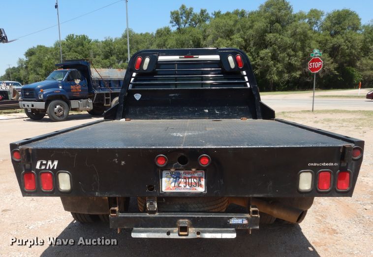 image for item HS9691 2005 Ford F350 Super Duty  Crew Cab flatbed pickup truck