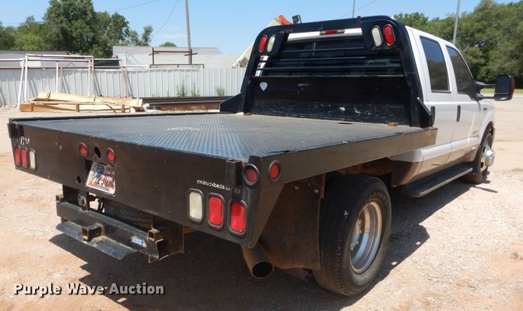 image for item HS9691 2005 Ford F350 Super Duty  Crew Cab flatbed pickup truck