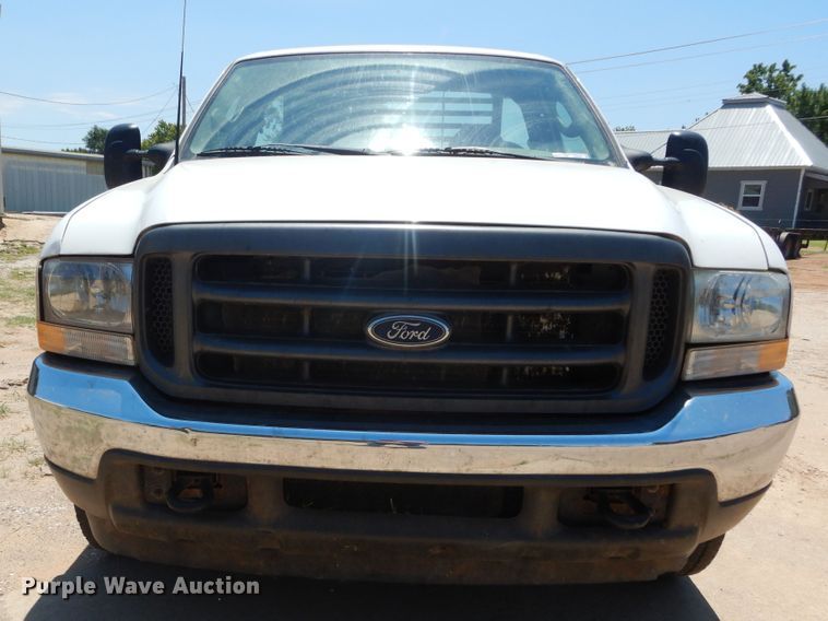 image for item HS9694 2003 Ford F250 Super Duty  flatbed pickup truck