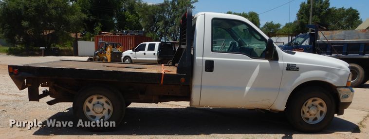 image for item HS9694 2003 Ford F250 Super Duty  flatbed pickup truck