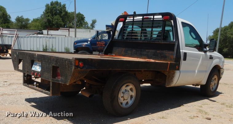 image for item HS9694 2003 Ford F250 Super Duty  flatbed pickup truck