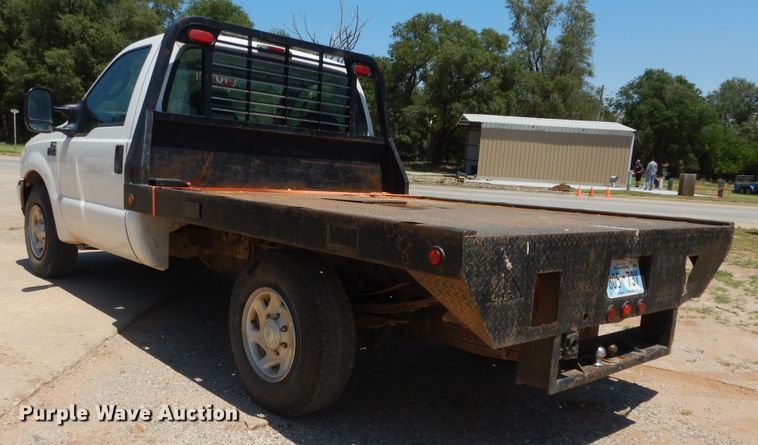 image for item HS9694 2003 Ford F250 Super Duty  flatbed pickup truck