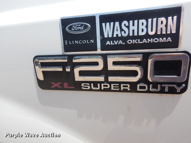 image for item HS9694 2003 Ford F250 Super Duty  flatbed pickup truck