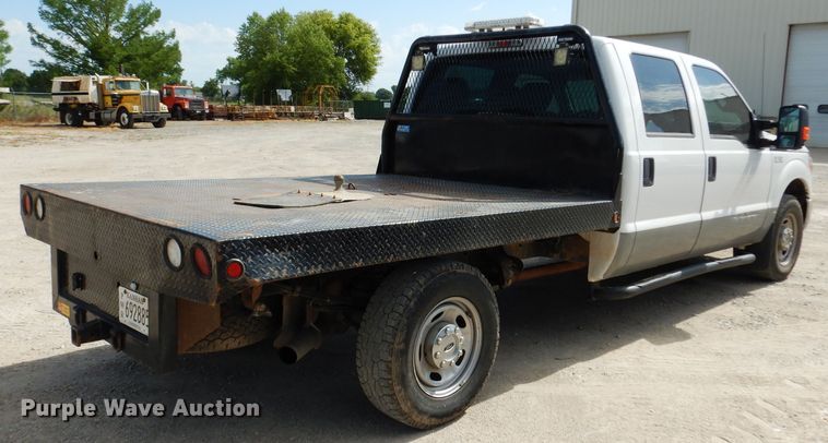 image for item DF4106 2016 Ford F250 Super Duty  Crew Cab flatbed pickup truck