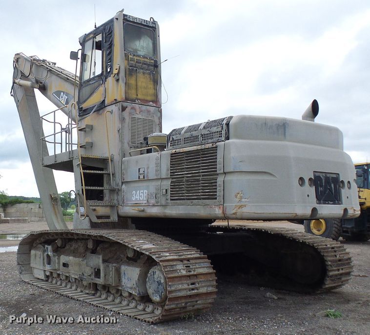 image for item DG5717 1999 Caterpillar 345B  material handler hydraulic excavator