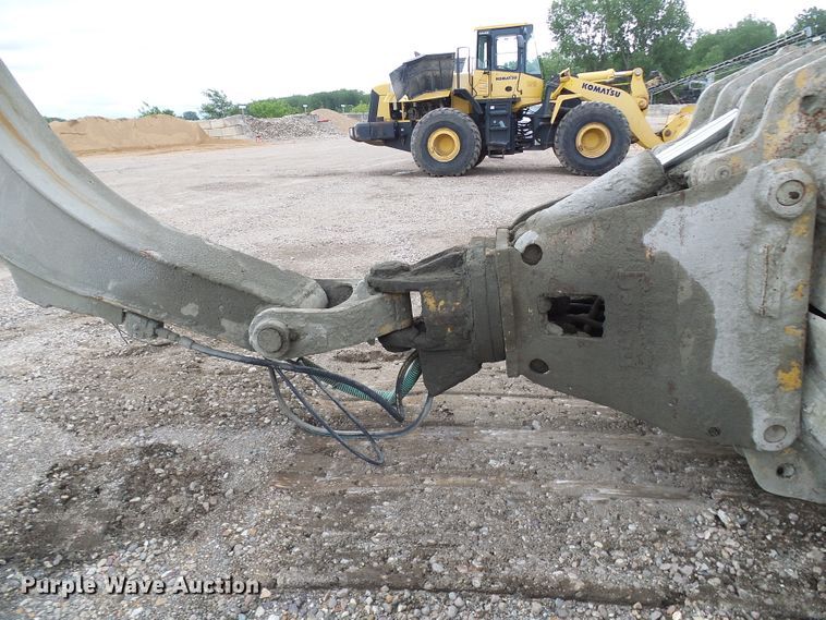 image for item DG5717 1999 Caterpillar 345B  material handler hydraulic excavator