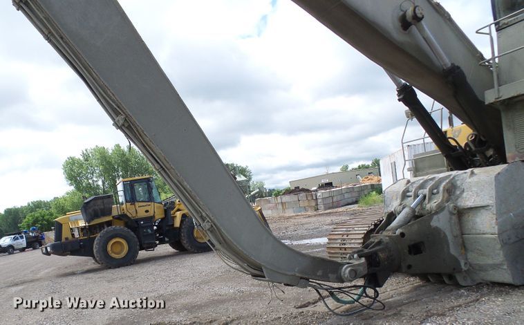 image for item DG5717 1999 Caterpillar 345B  material handler hydraulic excavator