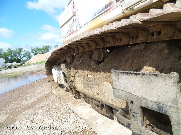 image for item DG5717 1999 Caterpillar 345B  material handler hydraulic excavator