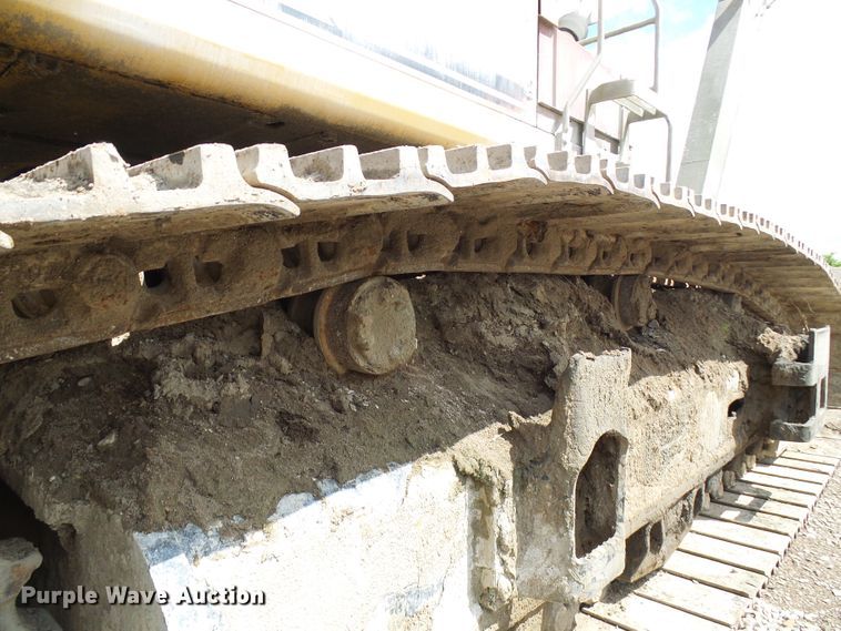 image for item DG5717 1999 Caterpillar 345B  material handler hydraulic excavator