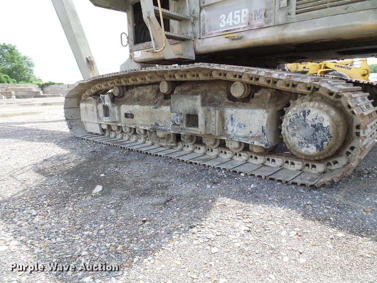 image for item DG5717 1999 Caterpillar 345B  material handler hydraulic excavator