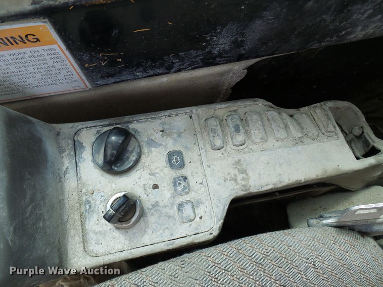 image for item DG5717 1999 Caterpillar 345B  material handler hydraulic excavator