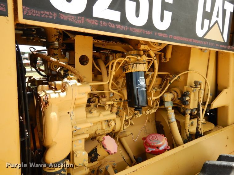 image for item DG6831 1998 Caterpillar CS-323C single drum vibratory roller