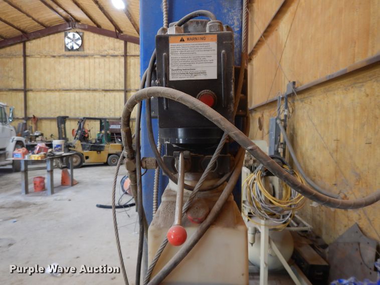 image for item DG7789 Titan two post automotive lift