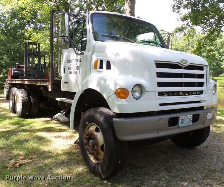 image for item DH3797 2004 Sterling L-Line  flatbed truck with forklift