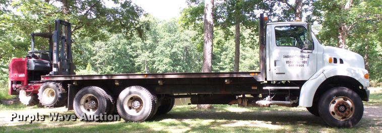 image for item DH3797 2004 Sterling L-Line  flatbed truck with forklift