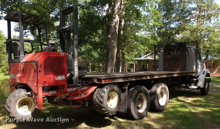 image for item DH3797 2004 Sterling L-Line  flatbed truck with forklift