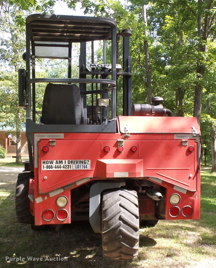 image for item DH3797 2004 Sterling L-Line  flatbed truck with forklift