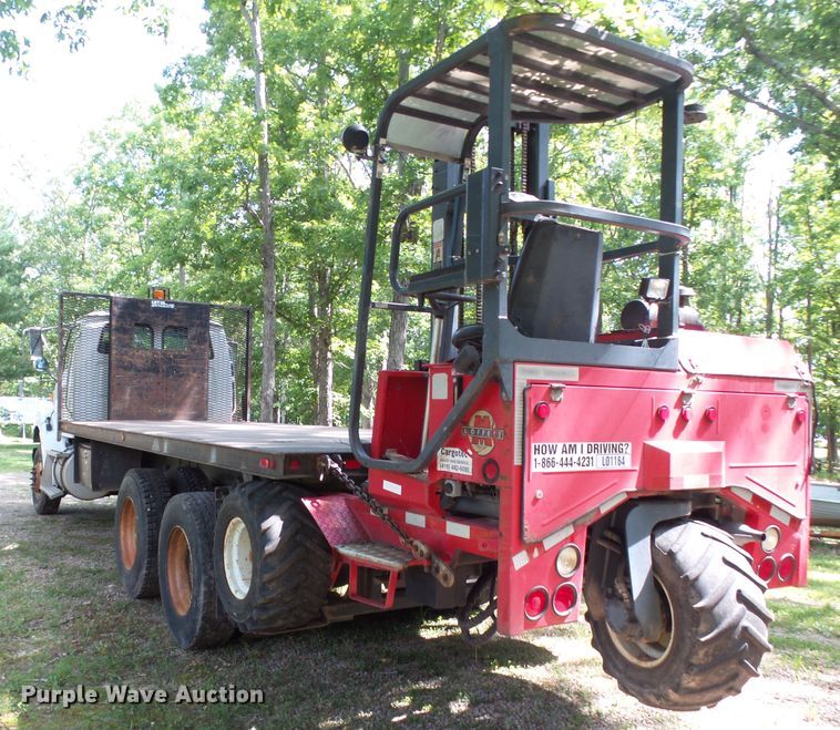 image for item DH3797 2004 Sterling L-Line  flatbed truck with forklift