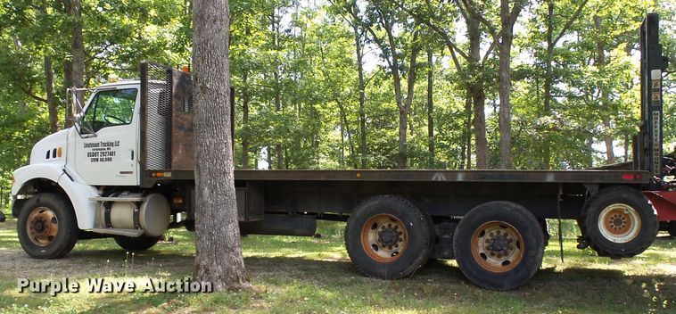 image for item DH3797 2004 Sterling L-Line  flatbed truck with forklift