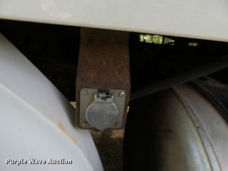 image for item DH3797 2004 Sterling L-Line  flatbed truck with forklift