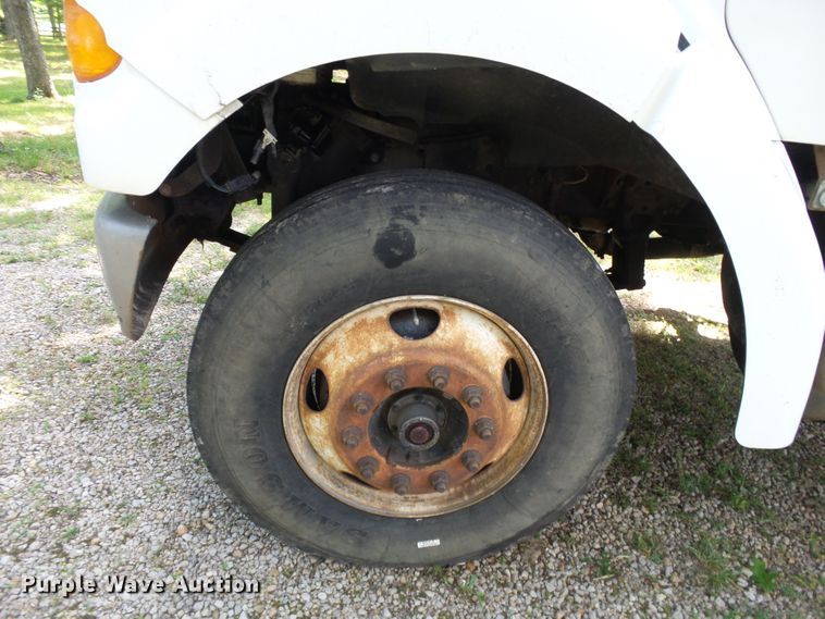 image for item DH3797 2004 Sterling L-Line  flatbed truck with forklift