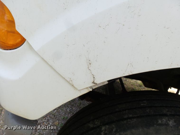 image for item DH3797 2004 Sterling L-Line  flatbed truck with forklift