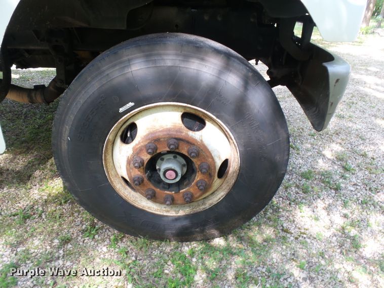 image for item DH3797 2004 Sterling L-Line  flatbed truck with forklift