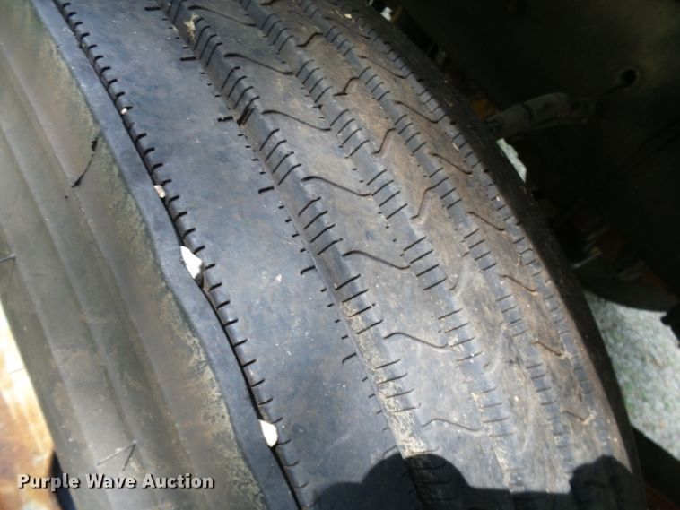 image for item DH3797 2004 Sterling L-Line  flatbed truck with forklift