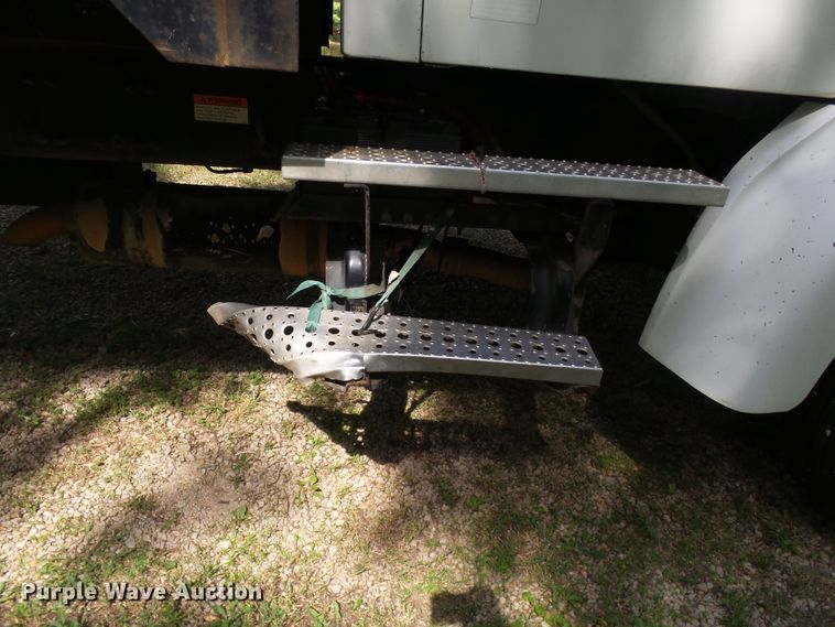 image for item DH3797 2004 Sterling L-Line  flatbed truck with forklift