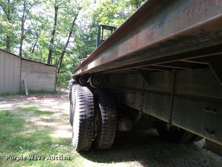 image for item DH3797 2004 Sterling L-Line  flatbed truck with forklift