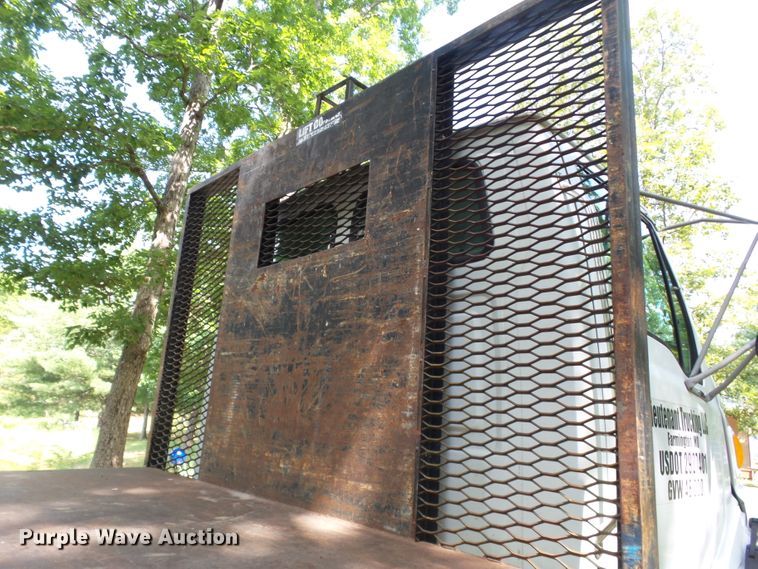 image for item DH3797 2004 Sterling L-Line  flatbed truck with forklift