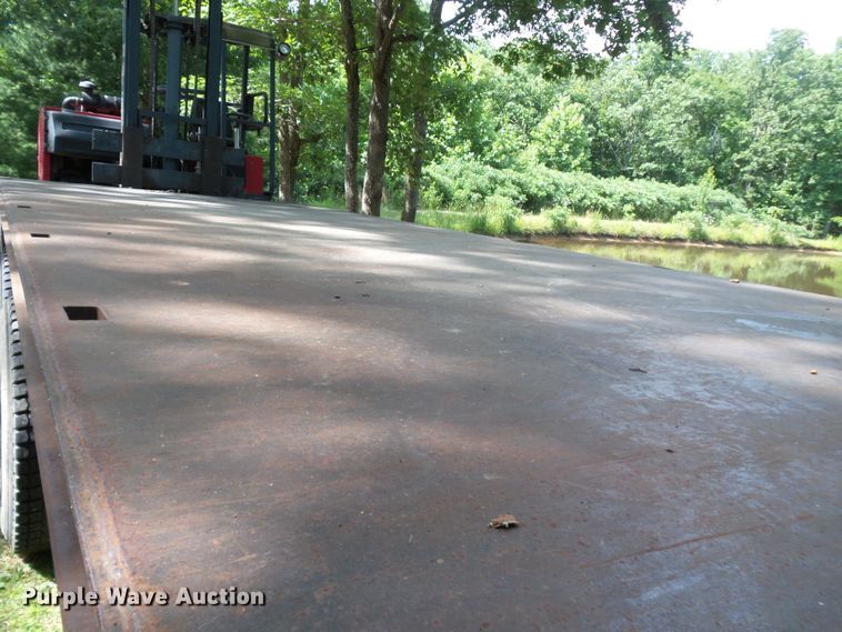 image for item DH3797 2004 Sterling L-Line  flatbed truck with forklift