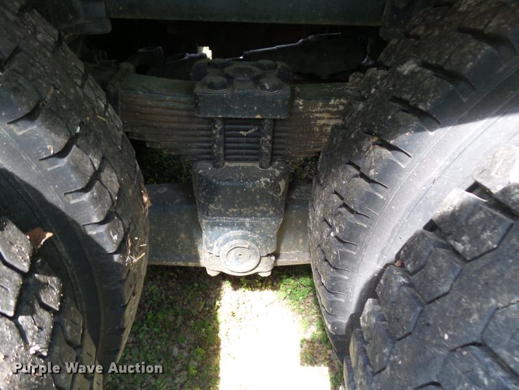 image for item DH3797 2004 Sterling L-Line  flatbed truck with forklift