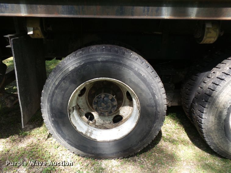 image for item DH3797 2004 Sterling L-Line  flatbed truck with forklift