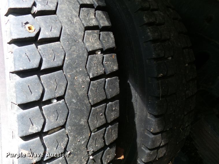 image for item DH3797 2004 Sterling L-Line  flatbed truck with forklift