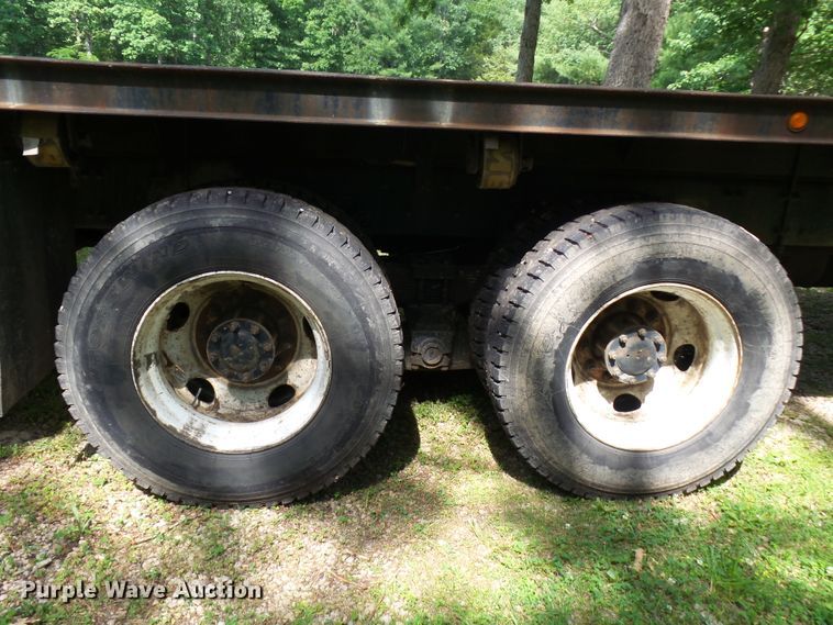 image for item DH3797 2004 Sterling L-Line  flatbed truck with forklift