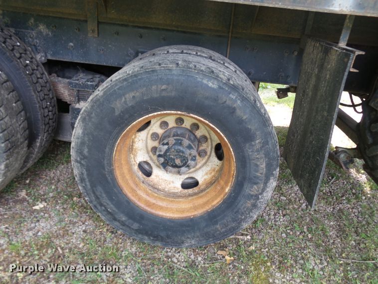 image for item DH3797 2004 Sterling L-Line  flatbed truck with forklift