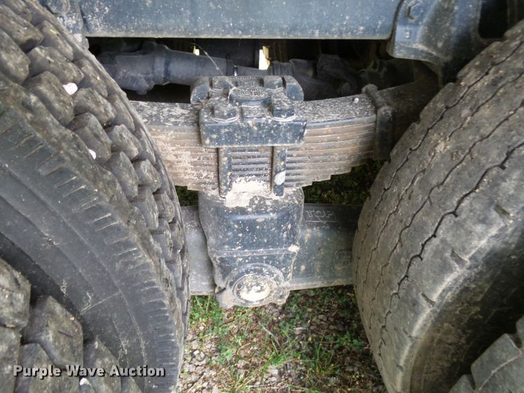 image for item DH3797 2004 Sterling L-Line  flatbed truck with forklift