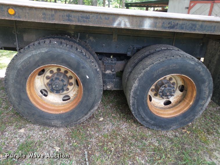 image for item DH3797 2004 Sterling L-Line  flatbed truck with forklift