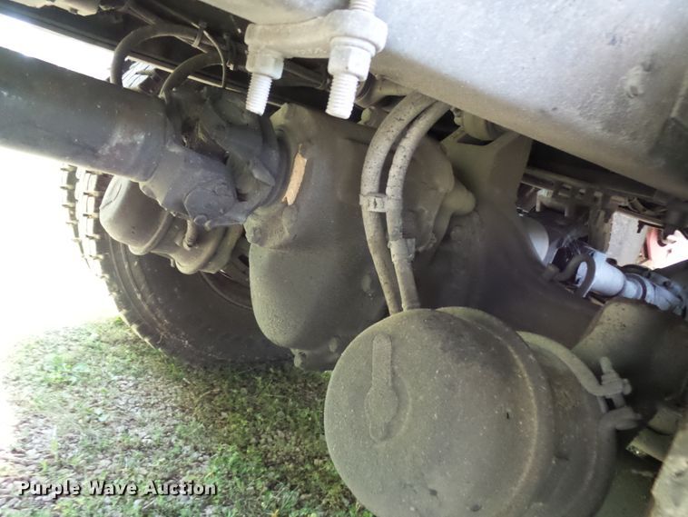 image for item DH3797 2004 Sterling L-Line  flatbed truck with forklift